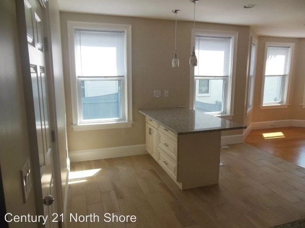 5 Pearl Street, Unit 1 Salem, MA 01970 - Photo 5 of 14 a view of kitchen and window
