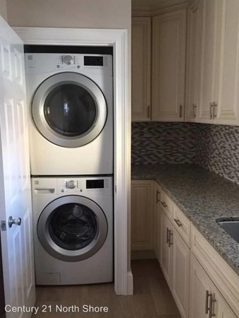 5 Pearl Street, Unit 1 Salem, MA 01970 - Photo 8 of 14 a utility room with sink dryer and washer