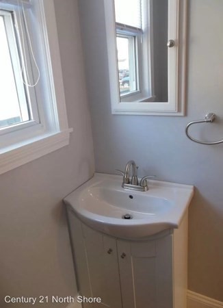 5 Pearl Street, Unit 1 Salem, MA 01970 - Photo 9 of 14 a bathroom with a sink and a window