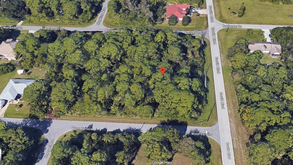 5249 Wynn Terrace Port Charlotte, FL 33981 - Photo 11 of 13 an aerial view of a garden