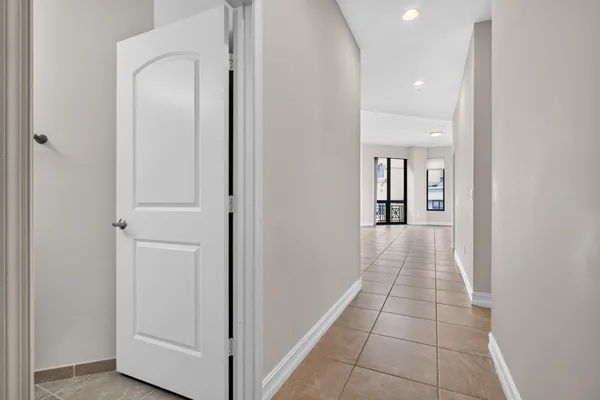 a view of a hallway with a furniture