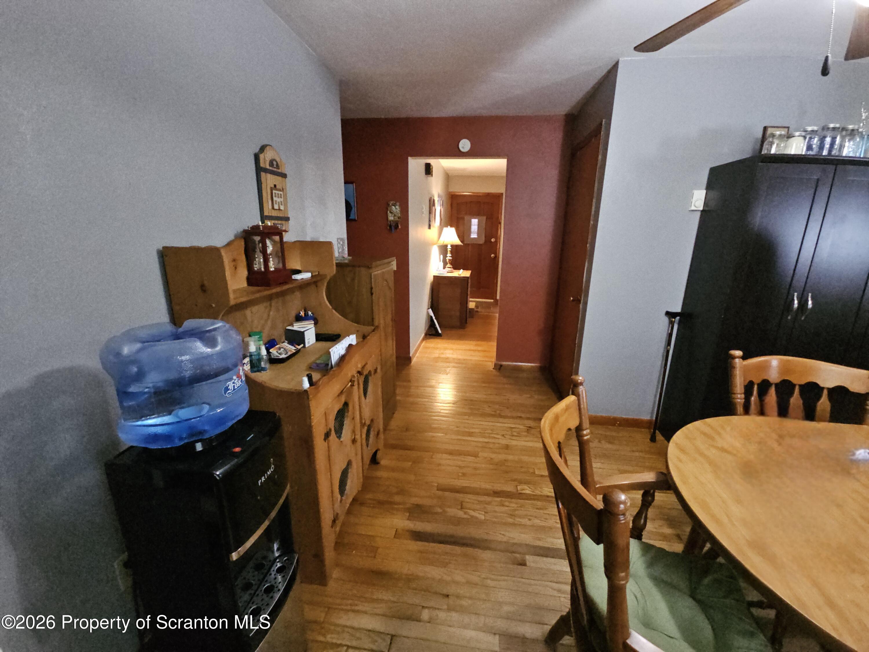 405 Baker Street Taylor, PA 18517 - Photo 13 of 36 a hallway with chairs and a dining table