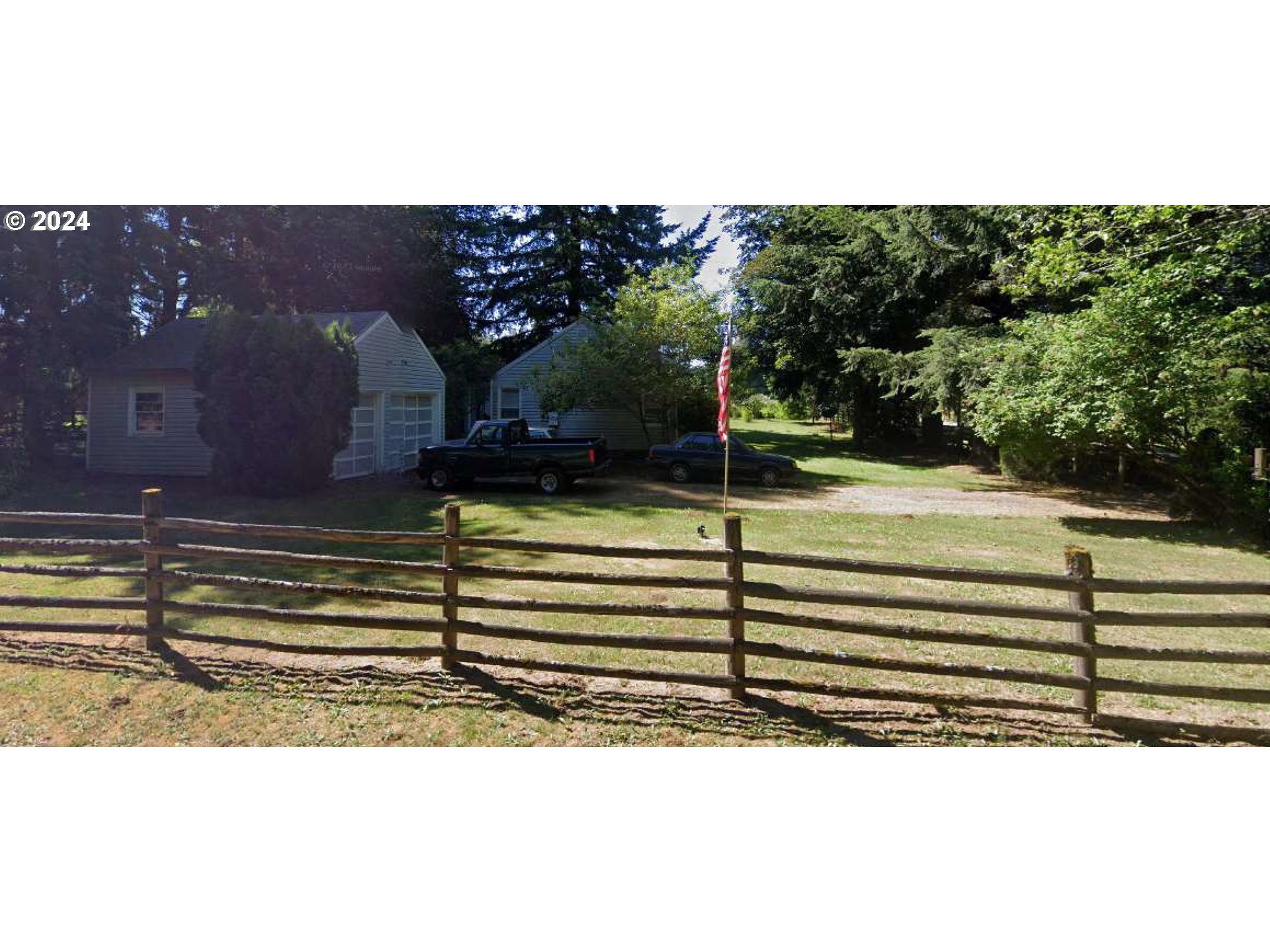a view of a yard with an outdoor space