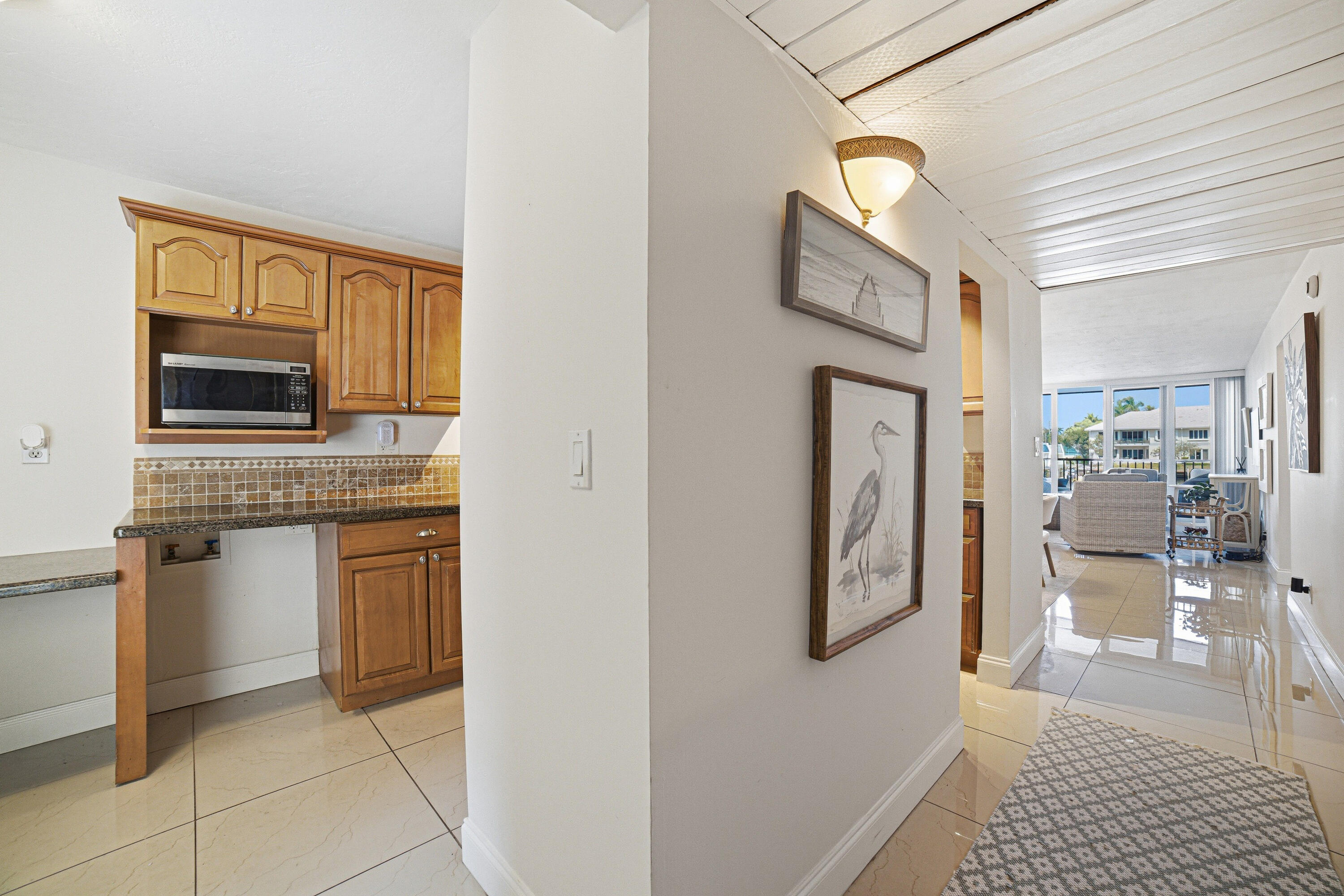 6 Royal Palm Way, Unit 211 Boca Raton, FL 33432 - Photo 11 of 32 Boca waterfront condo kitchen hallway ex