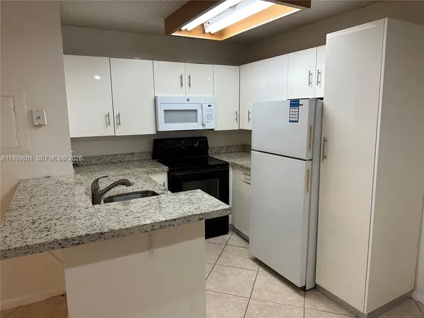 $1,650 | 951 Lyons Road, Unit 6103, Coconut Creek, FL 33063