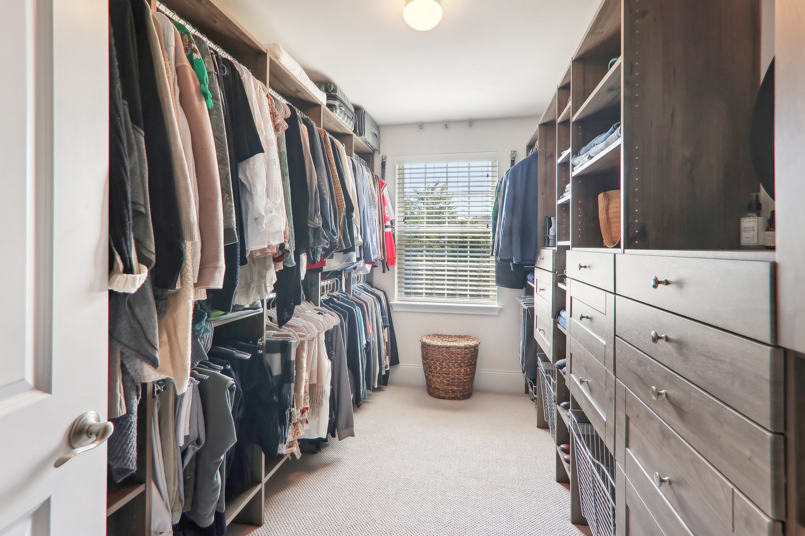 1228 Falcon Ridge Drive Elgin, IL 60124 - Photo 26 of 36 a view of walk in closet with clothes and shoes