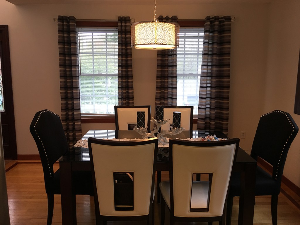 197 Acropolis Road Lowell, MA 01854 - Photo 11 of 29 a dining room with furniture and window