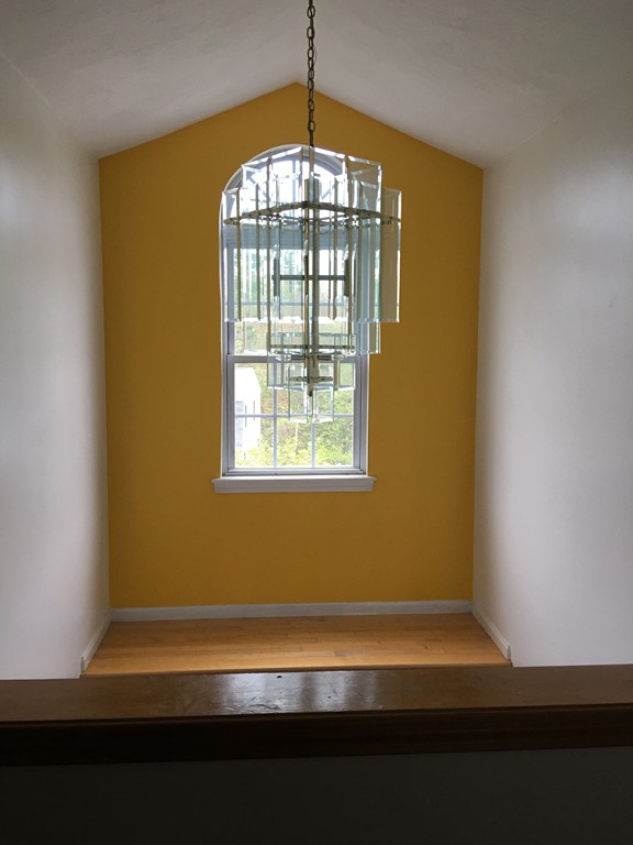 197 Acropolis Road Lowell, MA 01854 - Photo 29 of 29 a view of empty room with wooden floor and fan