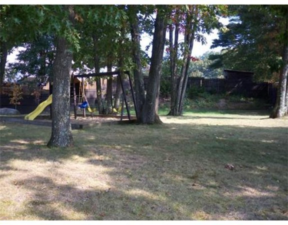 197 Acropolis Road Lowell, MA 01854 - Photo 5 of 29 a view of outdoor space with trees