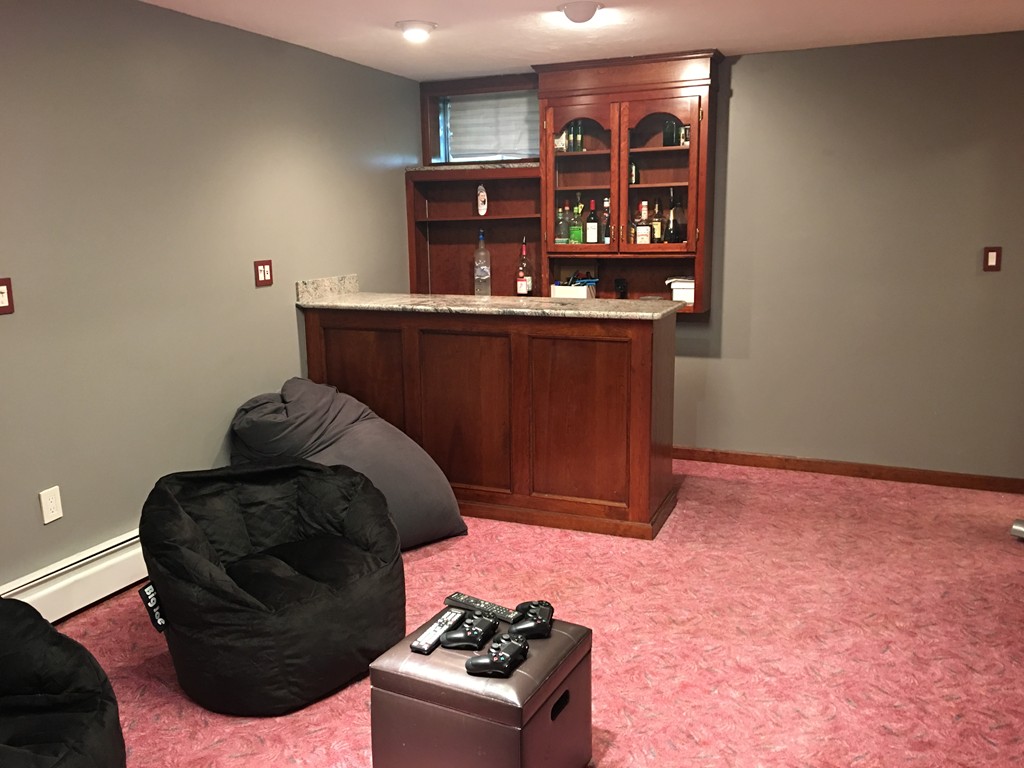 197 Acropolis Road Lowell, MA 01854 - Photo 9 of 29 a living room with furniture