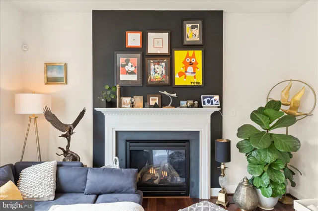 a kitchen with stainless steel appliances granite countertop a stove top oven a sink a counter space and cabinets