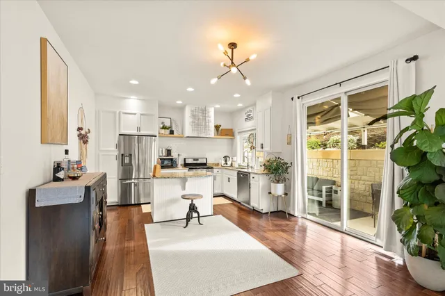 a view of living room with granite countertop furniture and fireplace