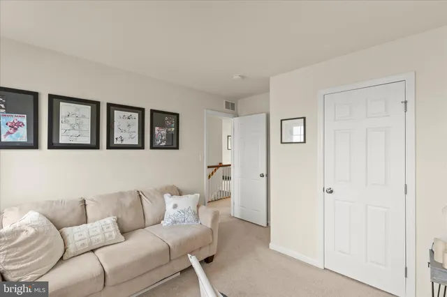 a view of a workspace with furniture and workspace