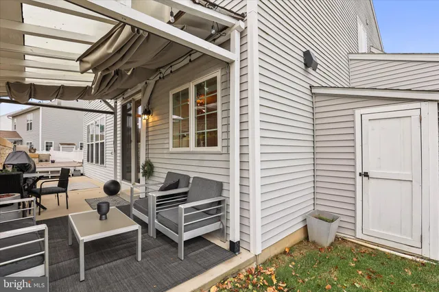 a view of balcony with wooden floor and fence