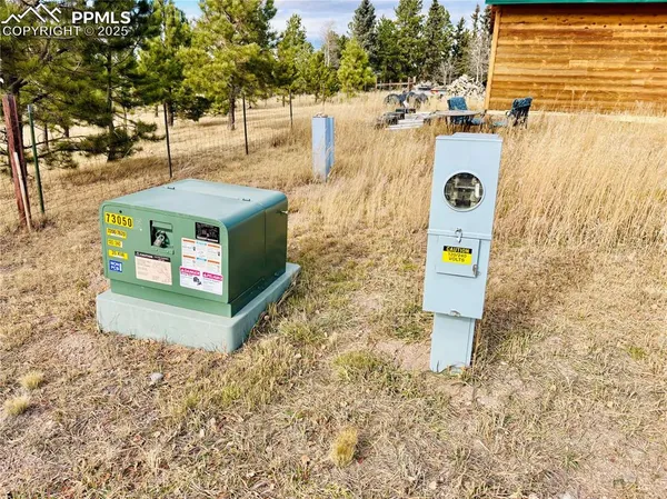 swimming pool view with a seating space