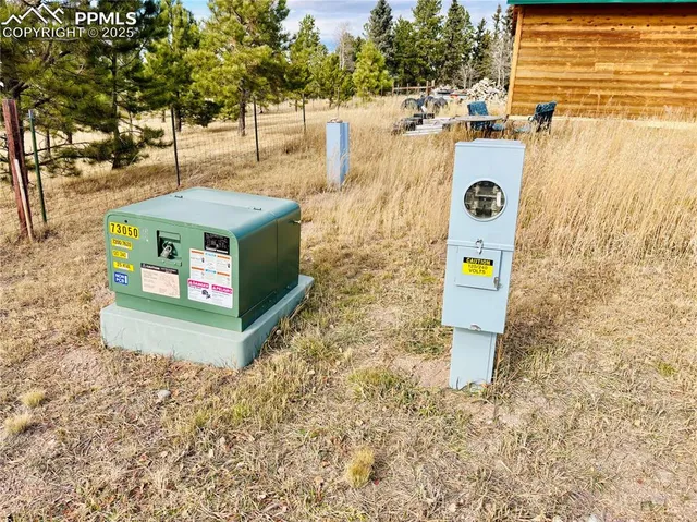 swimming pool view with a seating space