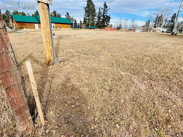a view of beach and yard