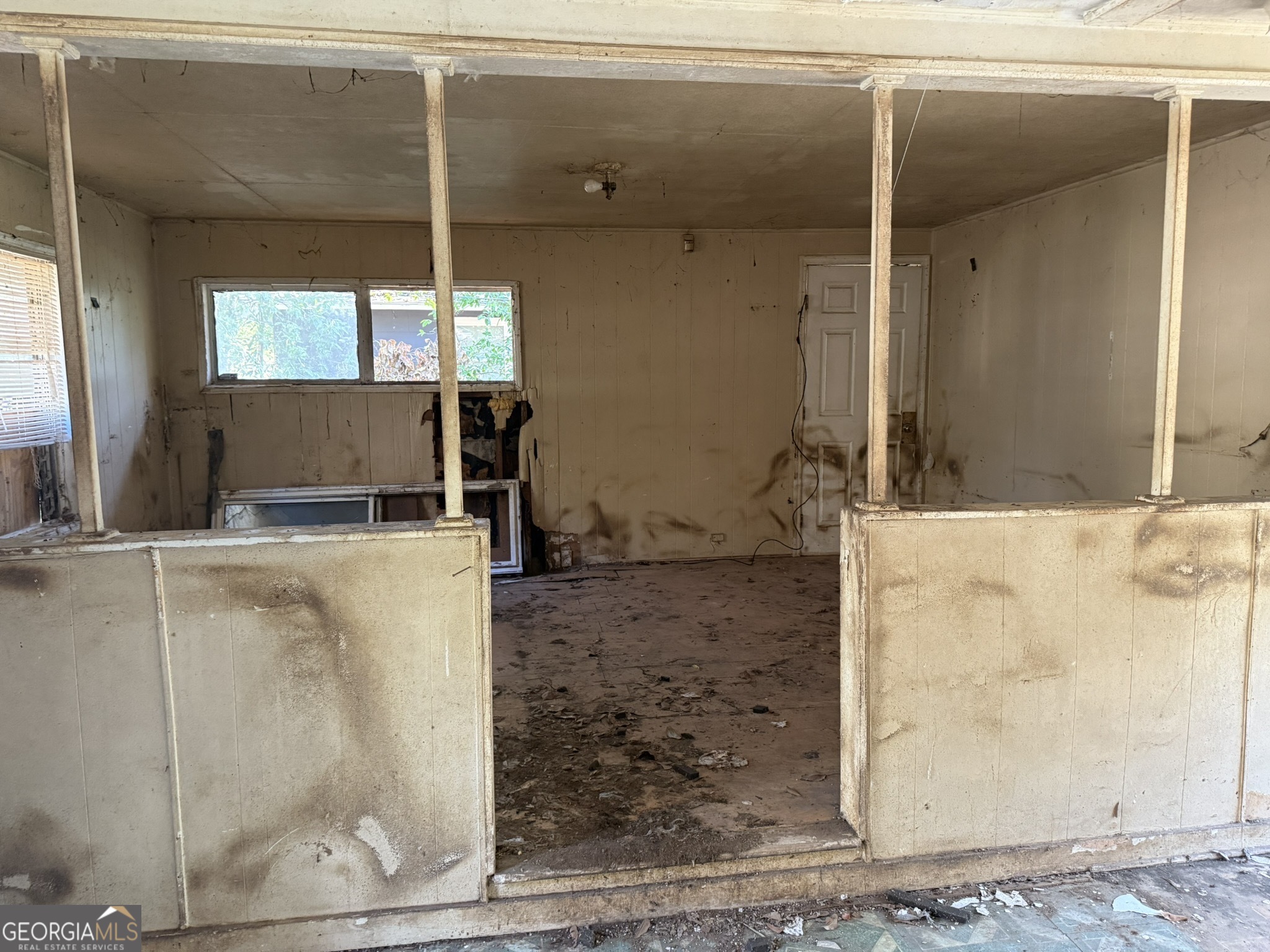 2468 Brevard Drive Macon, GA 31206 - Photo 12 of 27 a kitchen with a refrigerator and a sink