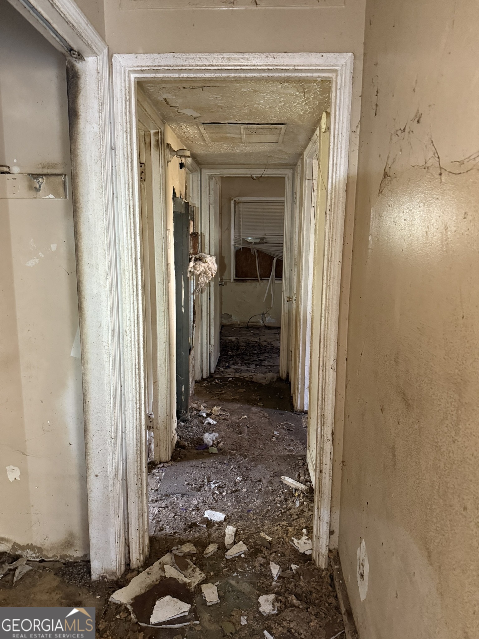 2468 Brevard Drive Macon, GA 31206 - Photo 17 of 27 a view of a hallway with wooden floor and a bathroom