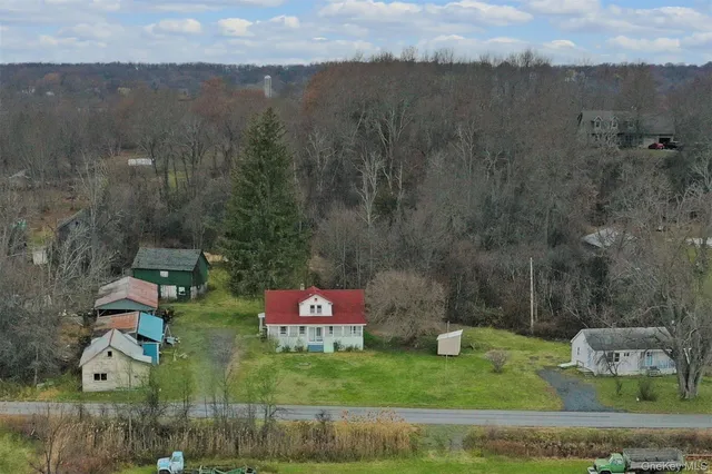 an aerial view of a house with garden