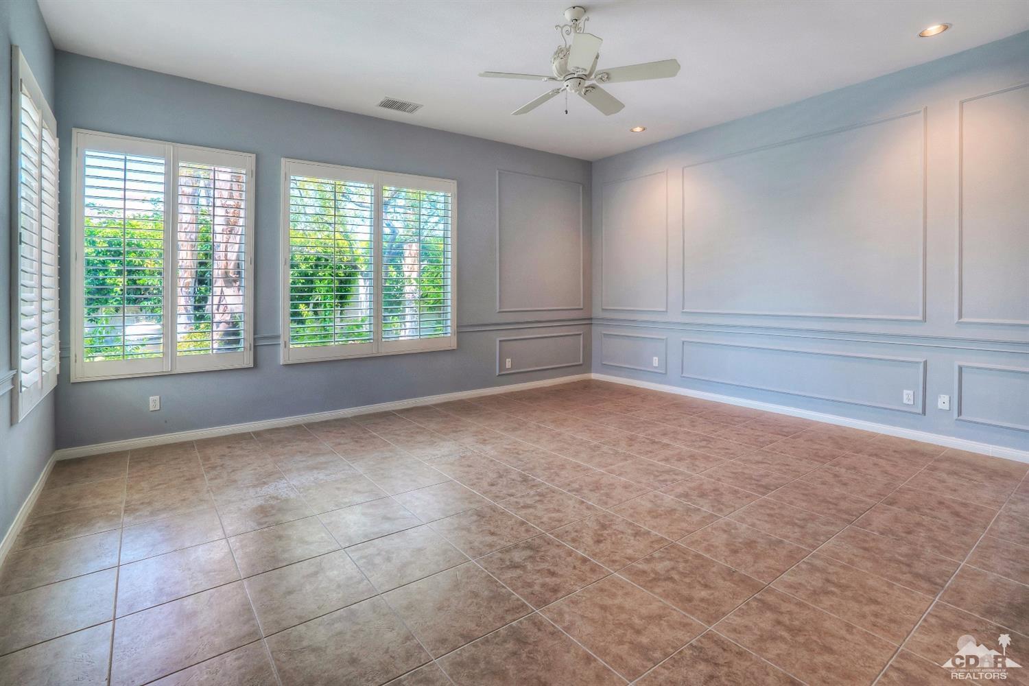 52 Sherwood Road Rancho Mirage, CA 92270 - Photo 13 of 25 a view of an empty room with a window