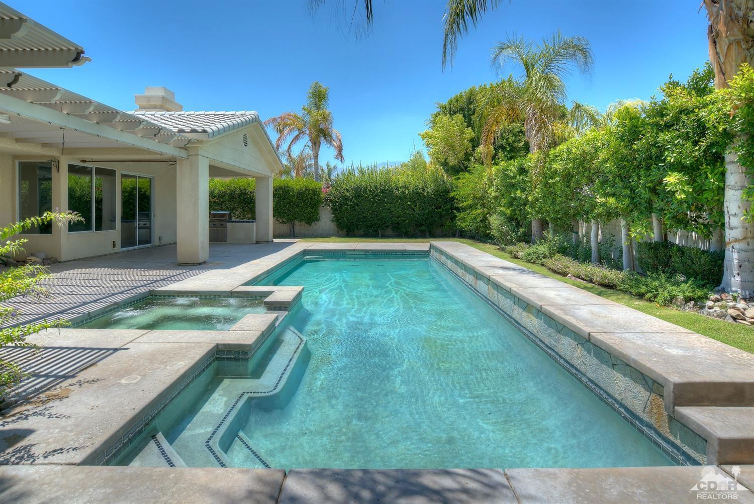 52 Sherwood Road Rancho Mirage, CA 92270 - Photo 22 of 25 a view of a house with a yard