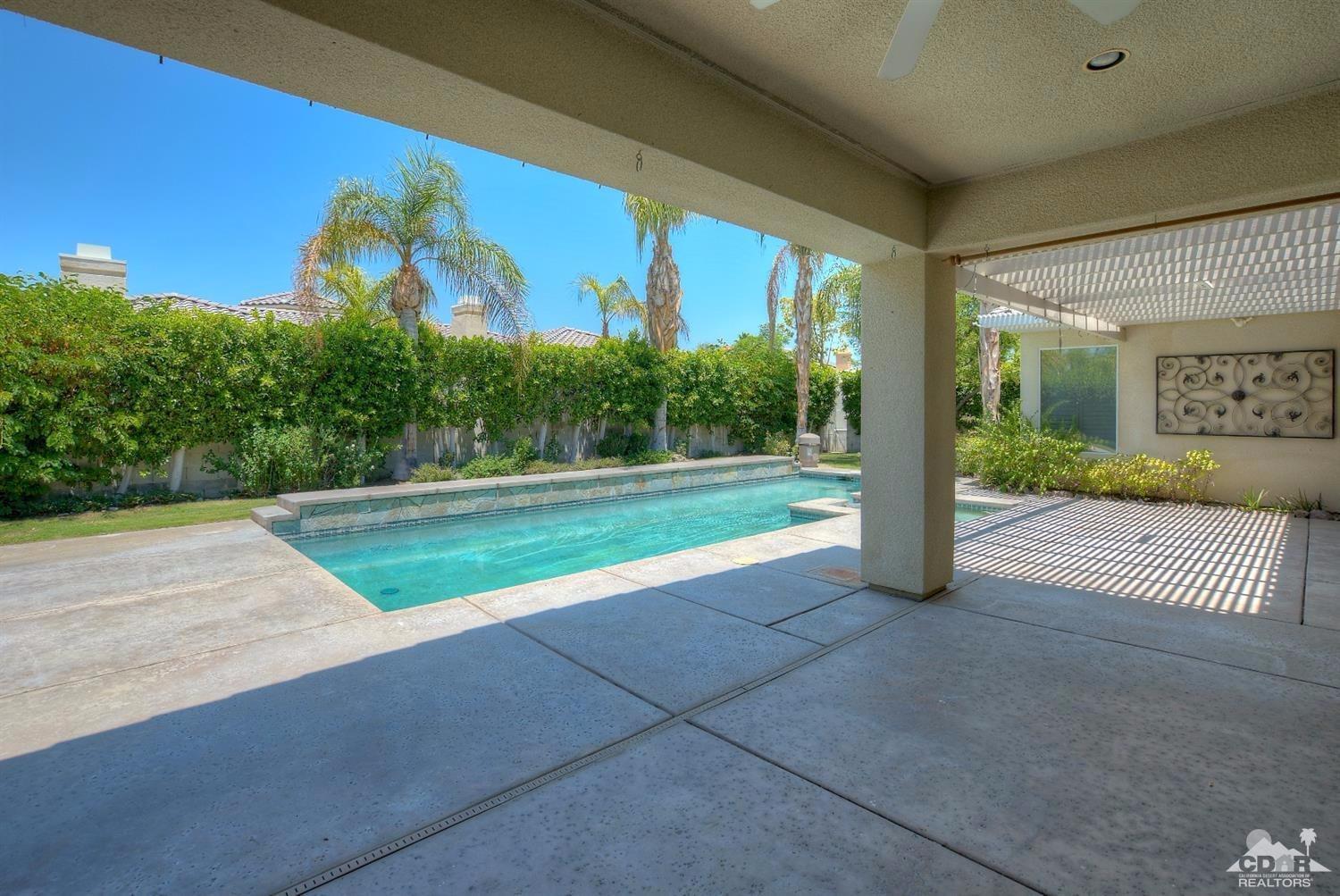 52 Sherwood Road Rancho Mirage, CA 92270 - Photo 23 of 25 a view of a room with porch and a yard