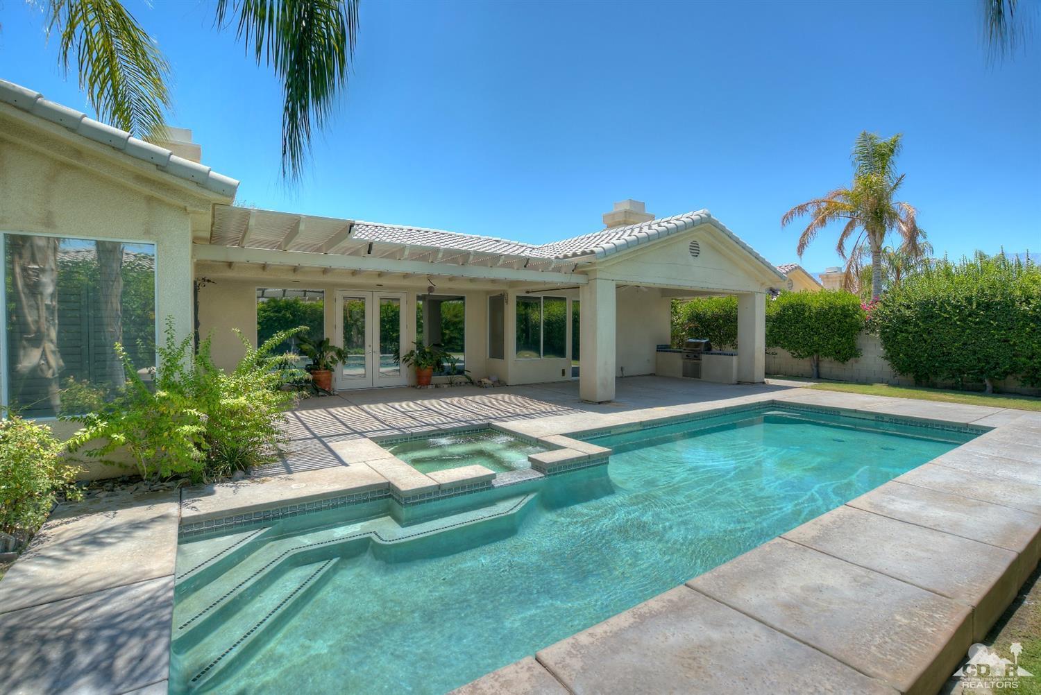 52 Sherwood Road Rancho Mirage, CA 92270 - Photo 24 of 25 a front view of a house with garden