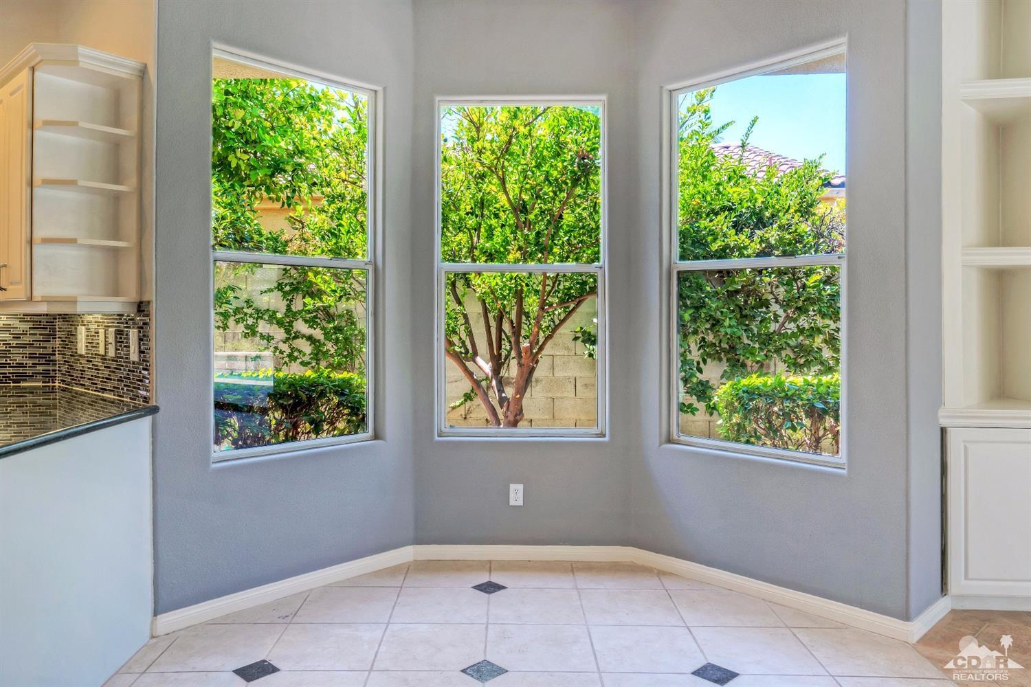 52 Sherwood Road Rancho Mirage, CA 92270 - Photo 10 of 25 a view of an empty room with a window