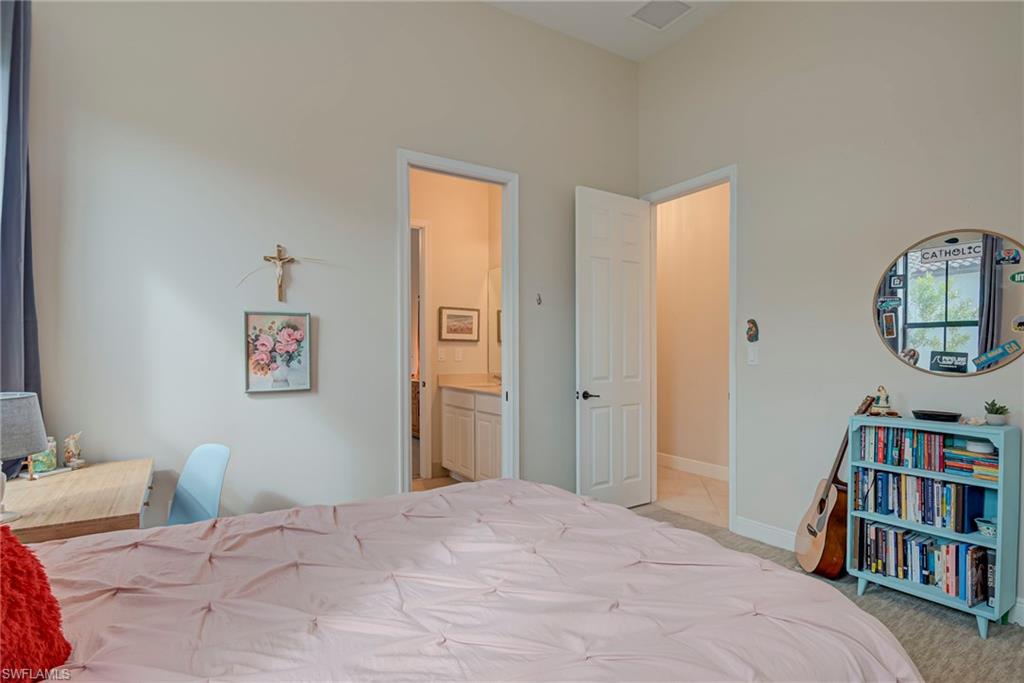 5344 Allen Place Ave Maria, FL 34142 - Photo 16 of 43 Bedroom #2 with light carpet and Jack N Jill Bath