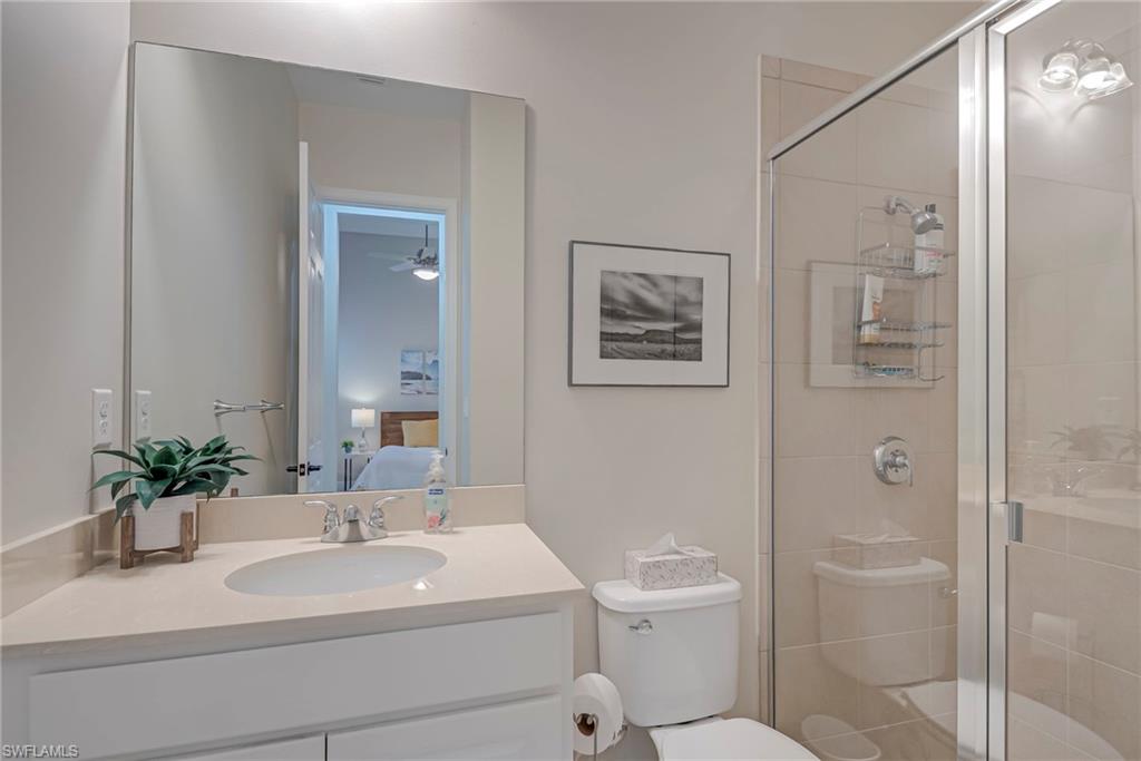 5344 Allen Place Ave Maria, FL 34142 - Photo 21 of 43 En Suite Private Bathroom for Bedroom #4 featuring a shower stall, and vanity.