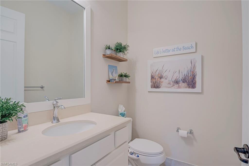 5344 Allen Place Ave Maria, FL 34142 - Photo 29 of 43 1/2 Bath with toilet and vanity