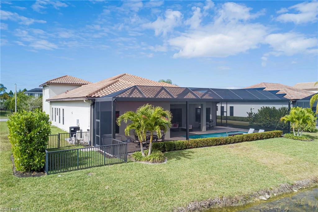 5344 Allen Place Ave Maria, FL 34142 - Photo 37 of 43 Side fenced area off lanai for family dog