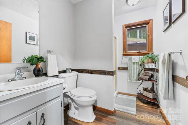 a bedroom with furniture and windows