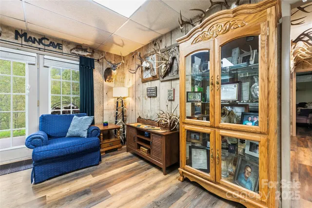 a kitchen with a refrigerator a sink and cabinets