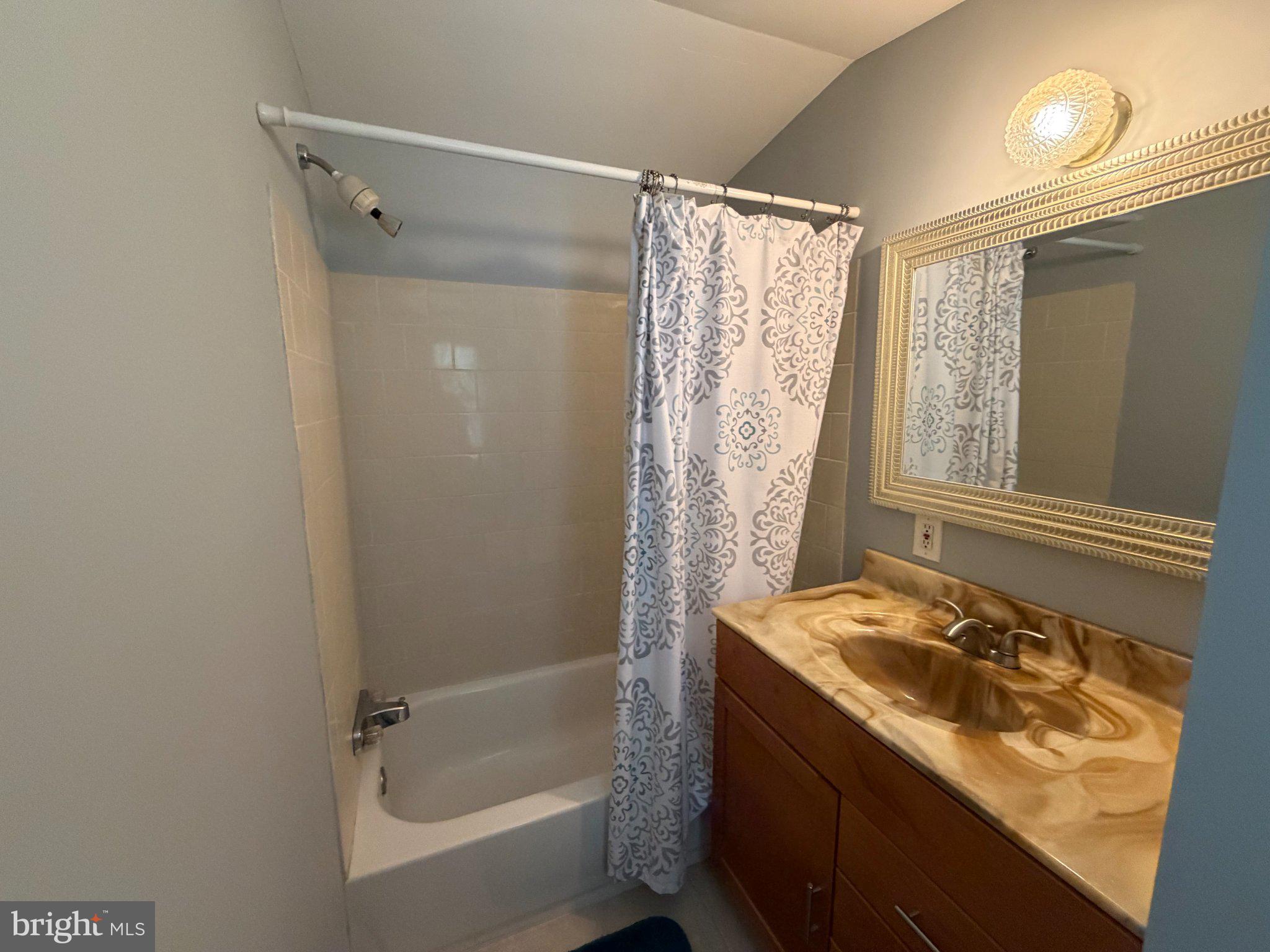 7923 Stork Road Alexandria, VA 22306 - Photo 10 of 17 Charming bathroom with modern touches.