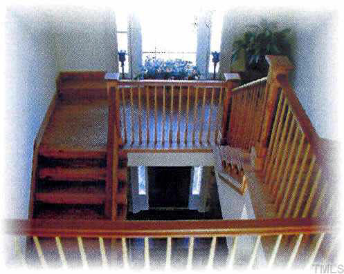 2800 Hawk Hill Road Mebane, NC 27302 - Photo 2 of 10 Spacious stairwell with landing.