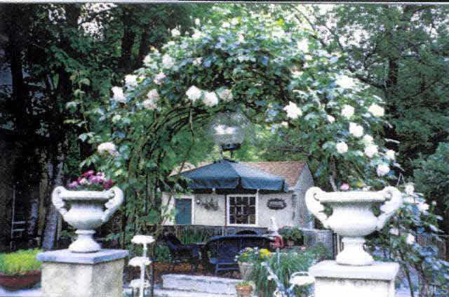 2800 Hawk Hill Road Mebane, NC 27302 - Photo 10 of 10 Arched walkway in garden.