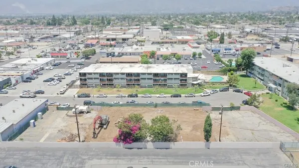 an aerial view of a house with a ocean view