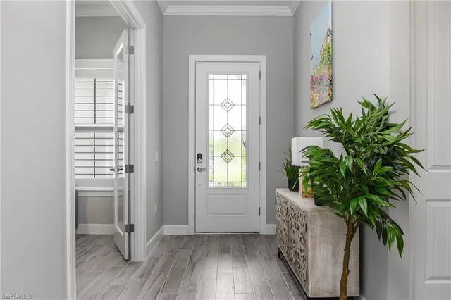 a room with window and wooden floor