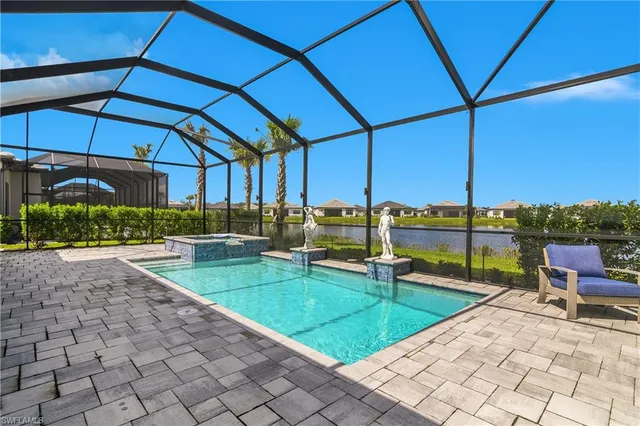 a view of a backyard with sitting area