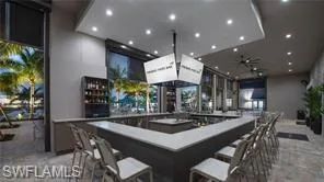 a kitchen with a table and chairs