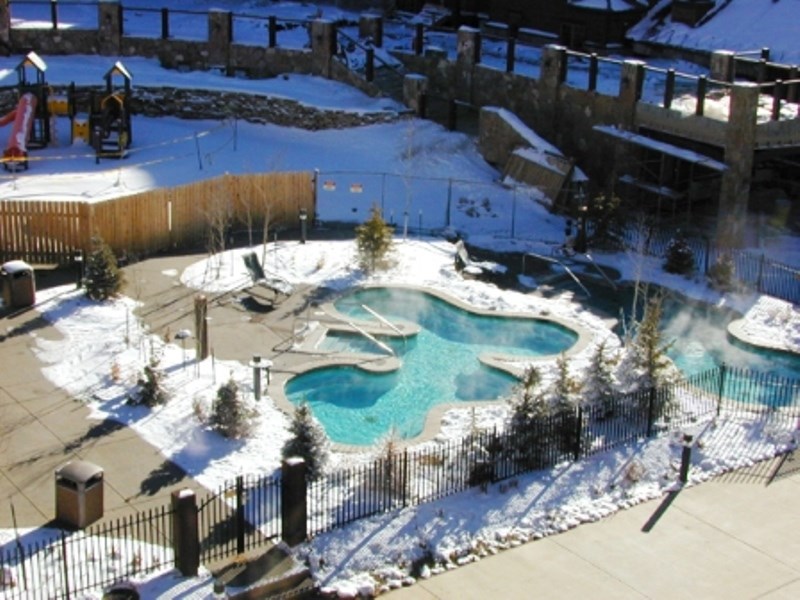 75 Snowflake Drive, Unit 227 Breckenridge, CO 80424 - Photo 11 of 15 a view of a house with a patio