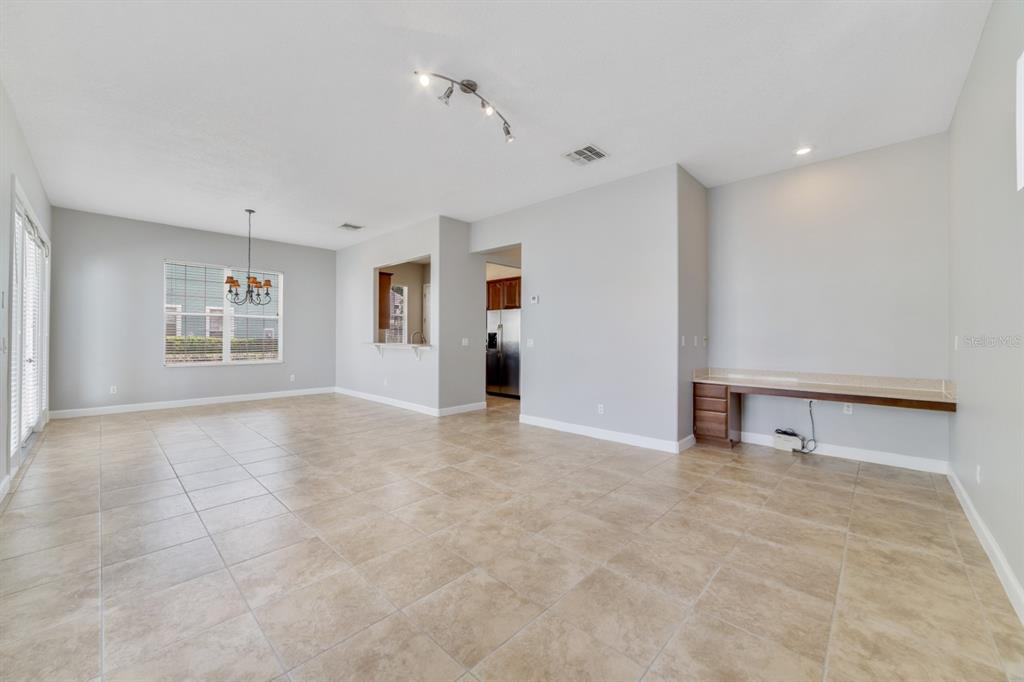 1426 Fairview Circle Reunion, FL 34747 - Photo 12 of 35 a view of an empty room with a window