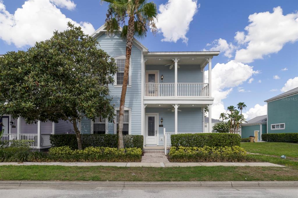 1426 Fairview Circle Reunion, FL 34747 - Photo 2 of 35 a view of a white house next to a yard