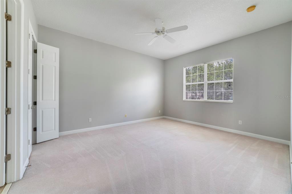 1426 Fairview Circle Reunion, FL 34747 - Photo 23 of 35 a view of an empty room with a window