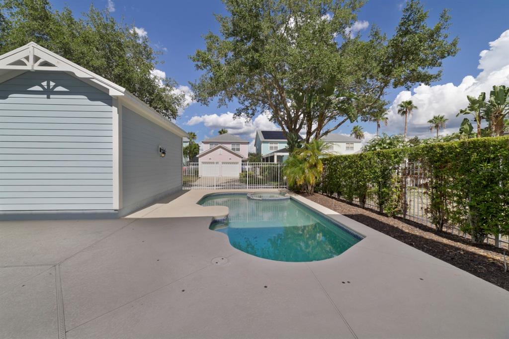 1426 Fairview Circle Reunion, FL 34747 - Photo 31 of 35 a view of a swimming pool with a patio