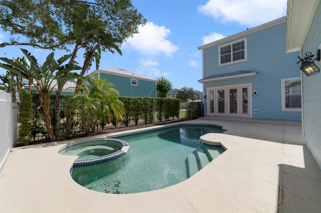 1426 Fairview Circle Reunion, FL 34747 - Photo 32 of 35 a view of a swimming pool with a patio