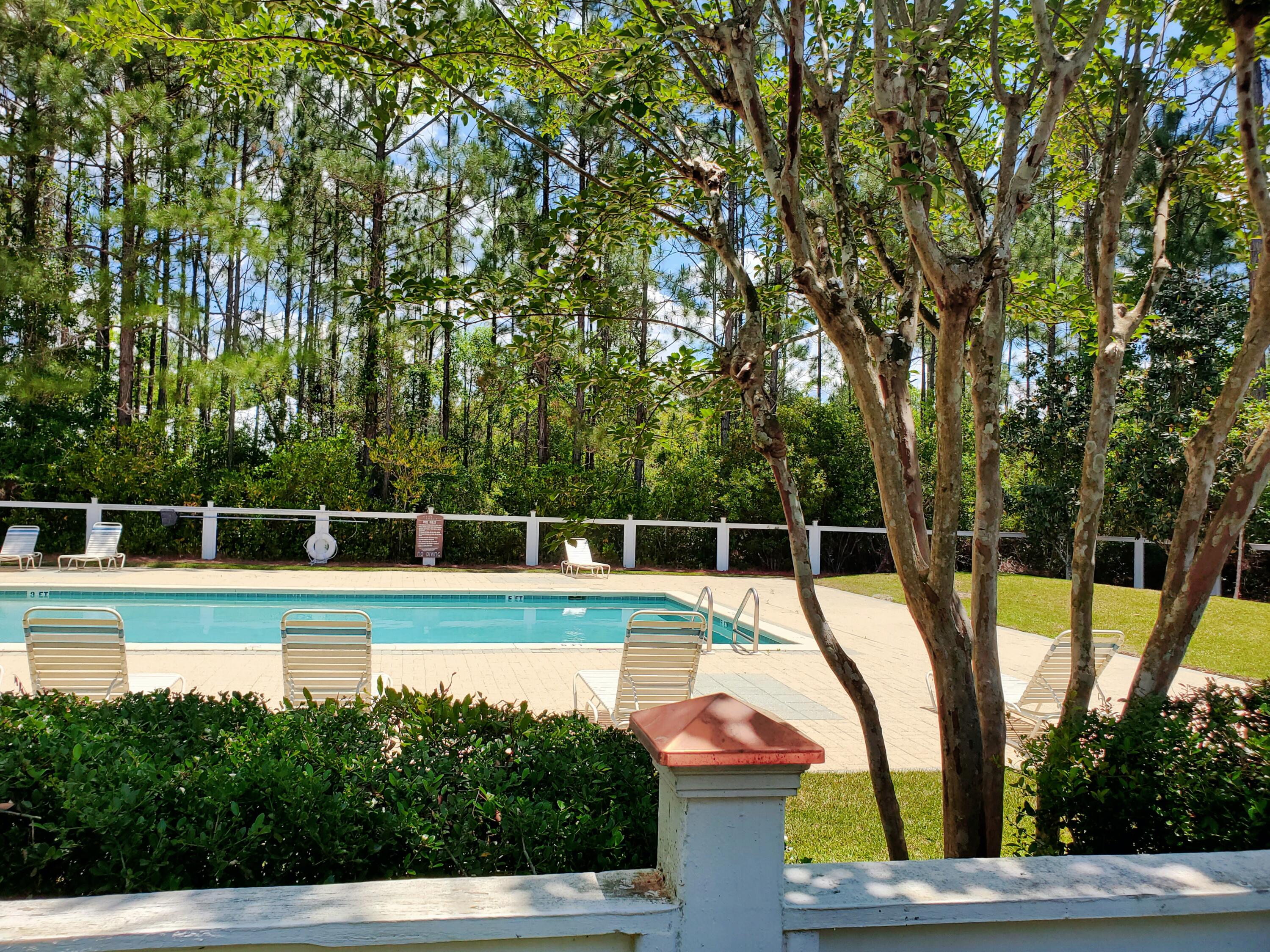Lot 9 Bear Creek Freeport, FL 32439 - Photo 7 of 9 a view of a swimming pool with a yard