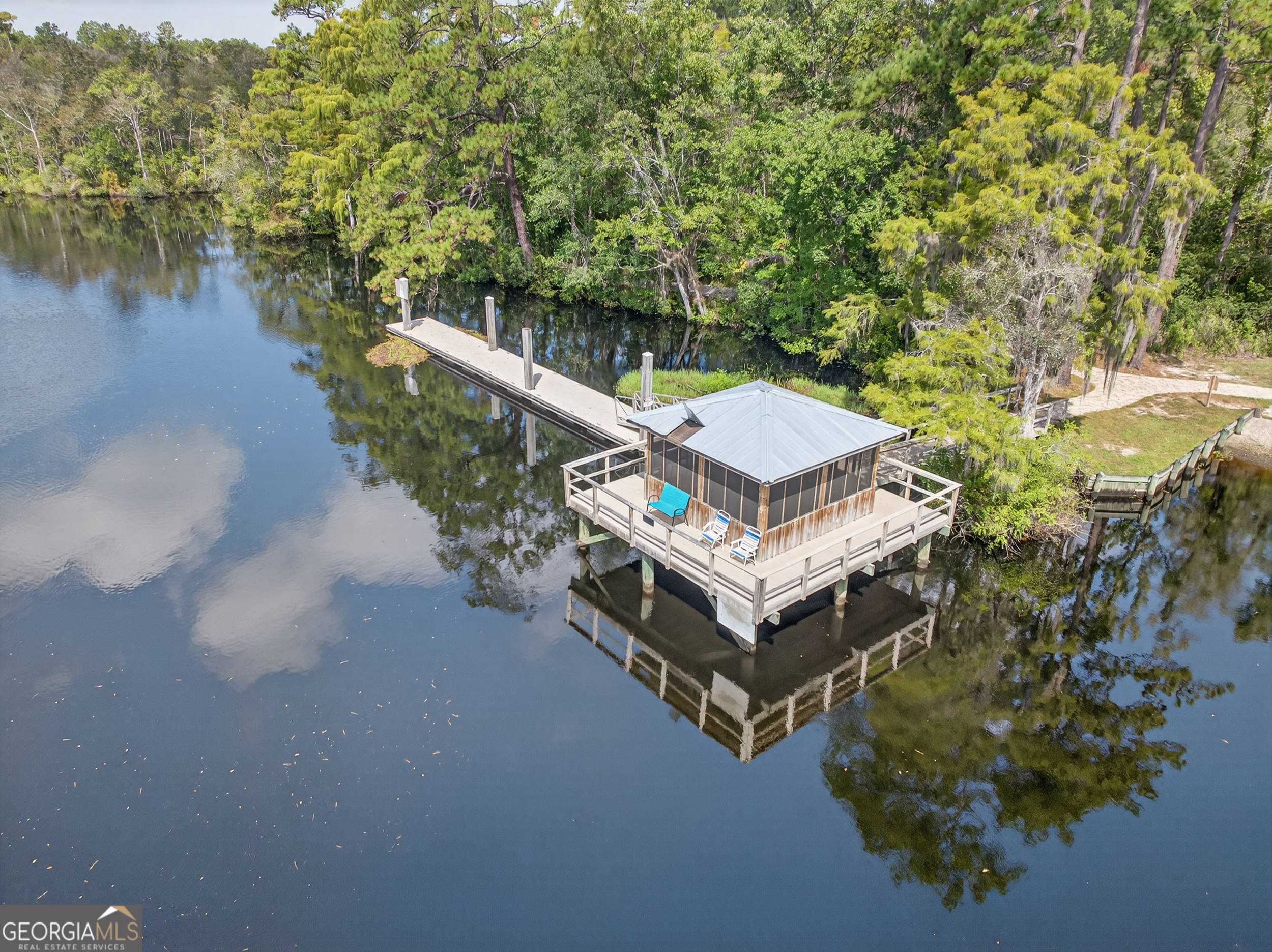 615 Breakwater Loop Kingsland, GA 31548 - Photo 11 of 25 a view of a house with pool and lake view